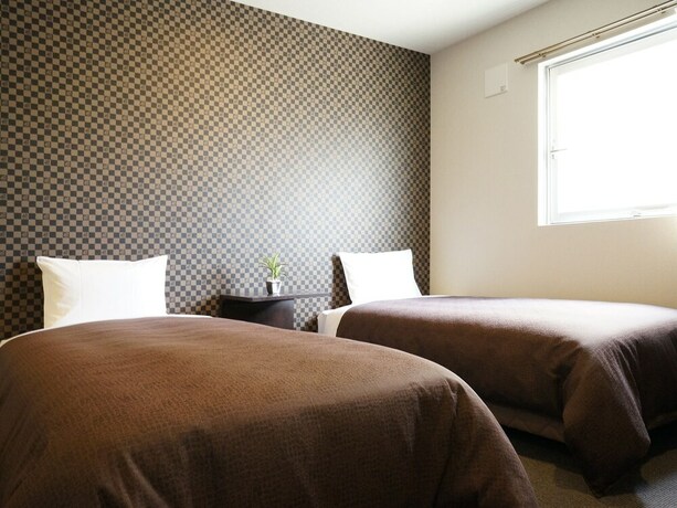 Imagen de la habitación del Hotel Livemax Himeji-ekimae. Foto 19