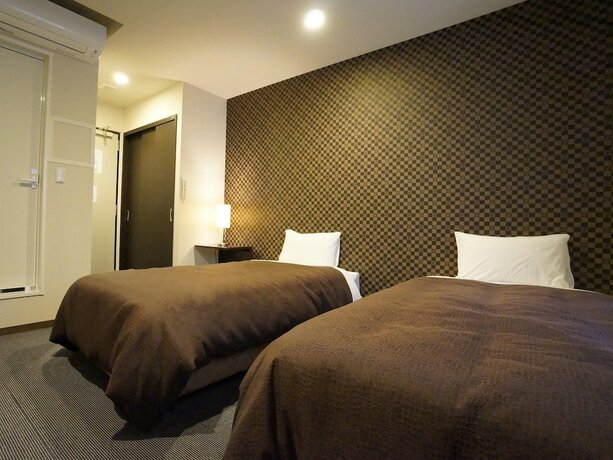 Imagen de la habitación del Hotel Livemax Himeji-ekimae. Foto 28