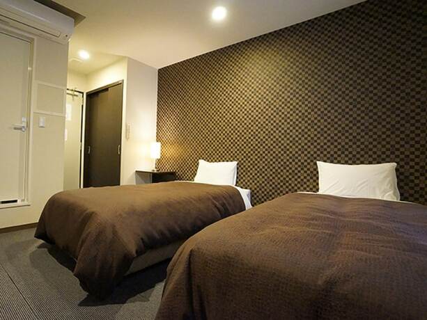 Imagen de la habitación del Hotel Livemax Himeji-ekimae. Foto 36