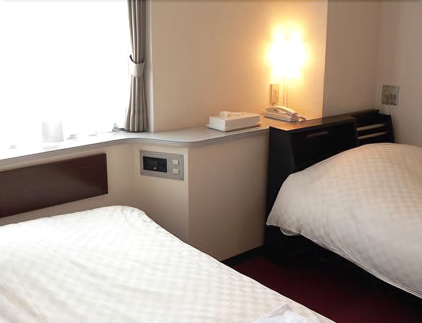 Imagen de la habitación del Hotel Livemax Iyo Mishima. Foto 7