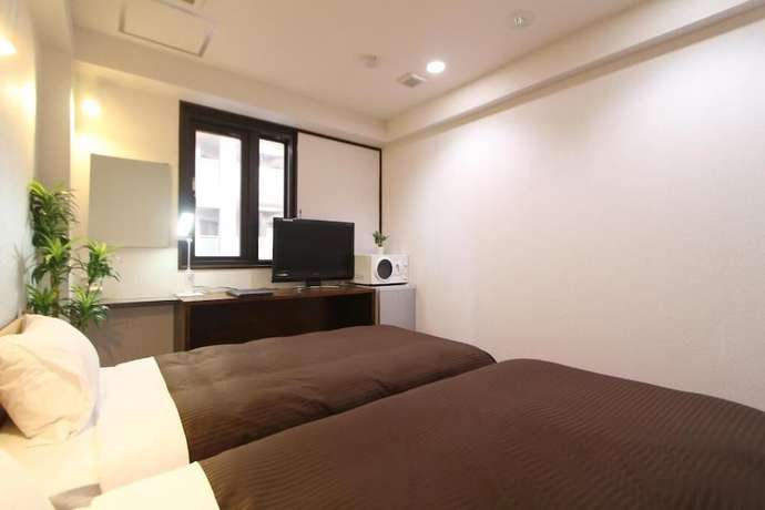 Imagen de la habitación del Hotel Livemax Kita Fuchu. Foto 3