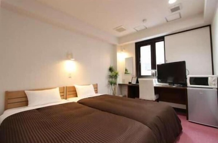 Imagen de la habitación del Hotel Livemax Kita Fuchu. Foto 18