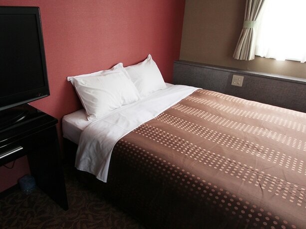 Imagen de la habitación del Hotel Livemax Kobe. Foto 6