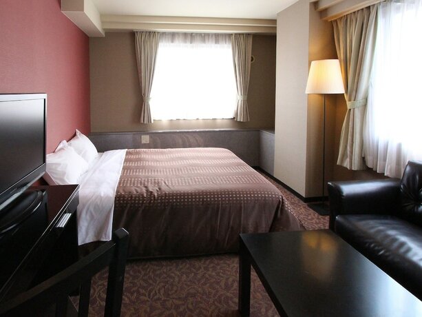 Imagen de la habitación del Hotel Livemax Kobe. Foto 7