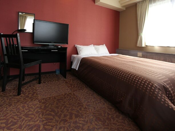 Imagen de la habitación del Hotel Livemax Kobe. Foto 8