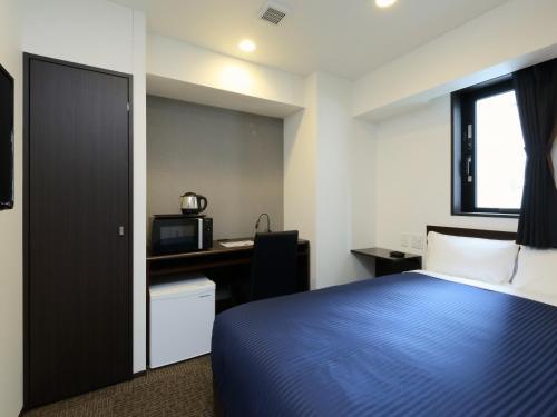 Imagen de la habitación del Hotel Livemax Mei-Eki. Foto 5
