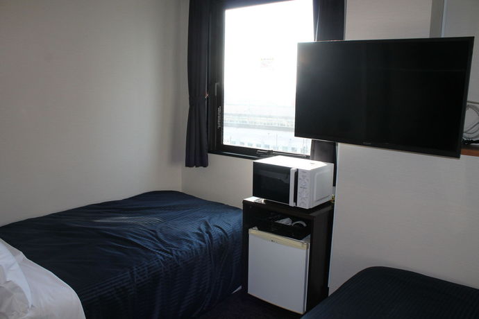 Imagen de la habitación del Hotel Livemax Mihara-ekimae. Foto 7