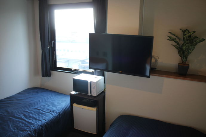 Imagen de la habitación del Hotel Livemax Mihara-ekimae. Foto 11