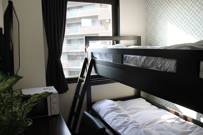 Imagen de la habitación del Hotel Livemax Mihara-ekimae. Foto 12