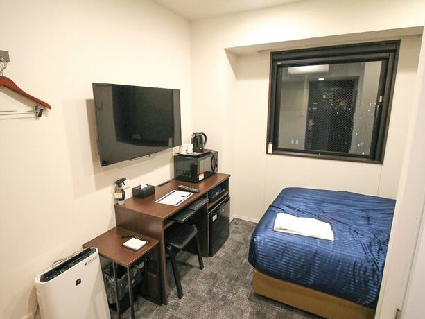 Imagen de la habitación del Hotel Livemax Nagoya Kanayama. Foto 19