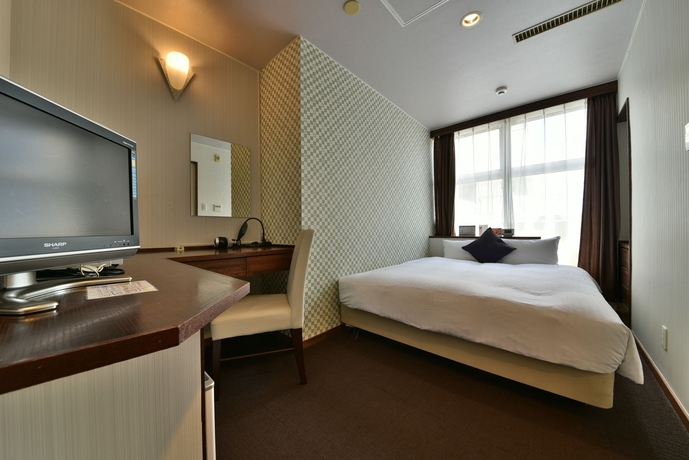 Imagen de la habitación del Hotel Livemax Naha Tomariko. Foto 5