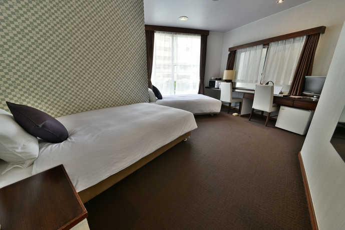 Imagen de la habitación del Hotel Livemax Naha Tomariko. Foto 7