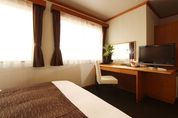 Imagen de la habitación del Hotel Livemax Naha Tomariko. Foto 8