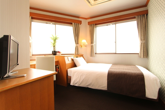 Imagen de la habitación del Hotel Livemax Naha Tomariko. Foto 9