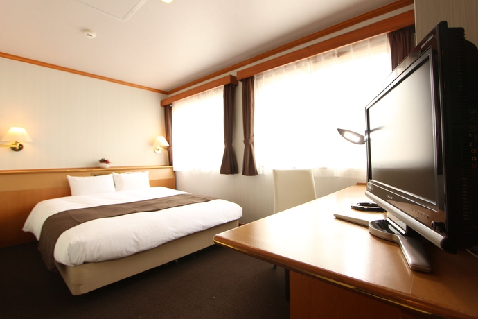 Imagen de la habitación del Hotel Livemax Naha Tomariko. Foto 11
