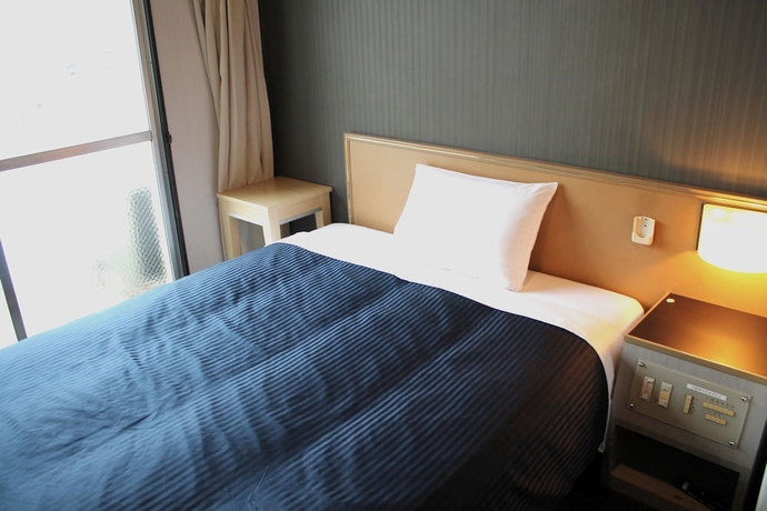 Imagen de la habitación del Hotel Livemax Namba. Foto 6