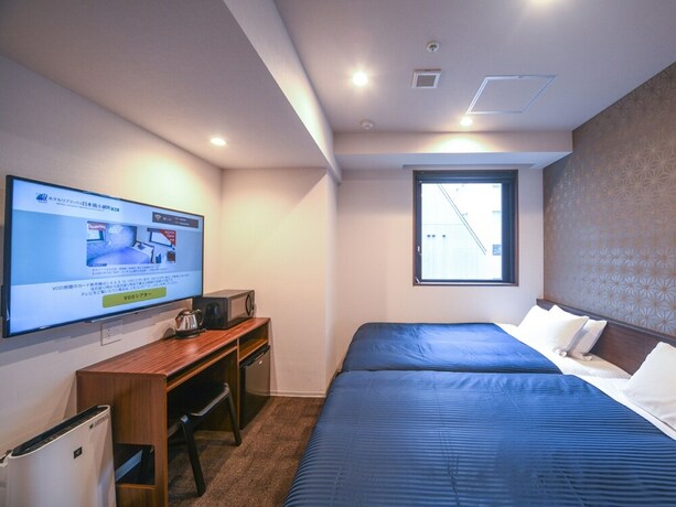 Imagen de la habitación del Hotel Livemax Nihonbashi Koamicho. Foto 11