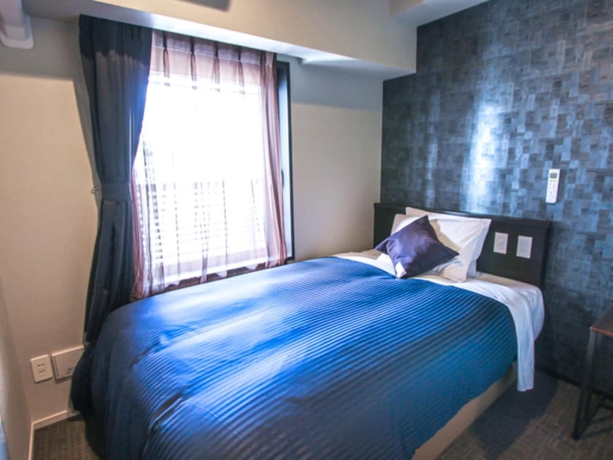Imagen de la habitación del Hotel Livemax Osaka Honmachi. Foto 4