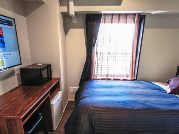 Imagen de la habitación del Hotel Livemax Osaka Honmachi. Foto 5