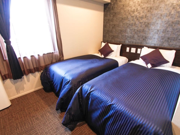 Imagen de la habitación del Hotel Livemax Osaka Honmachi. Foto 8