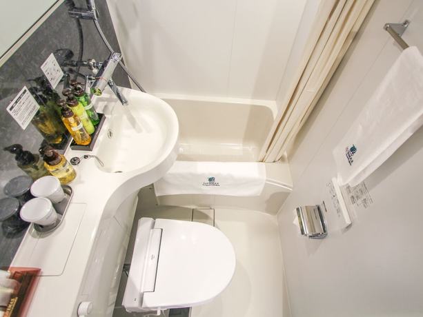 Imagen de la habitación del Hotel Livemax Osaka Kadoma. Foto 5