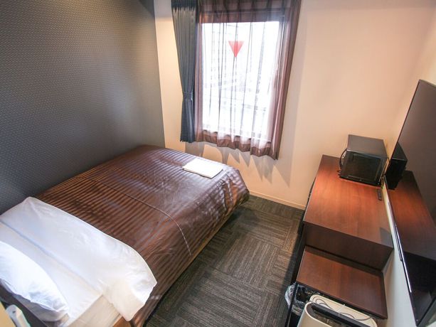 Imagen de la habitación del Hotel Livemax Osaka Kadoma. Foto 7