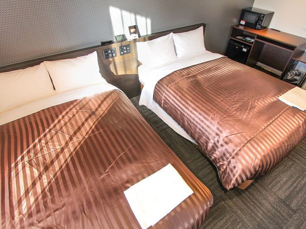 Imagen de la habitación del Hotel Livemax Osaka Kadoma. Foto 8