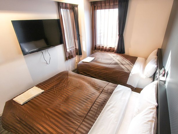Imagen de la habitación del Hotel Livemax Osaka Kadoma. Foto 10