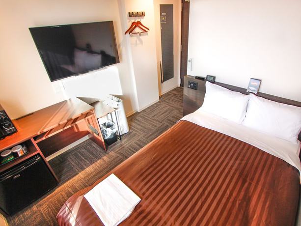 Imagen de la habitación del Hotel Livemax Osaka Kadoma. Foto 11