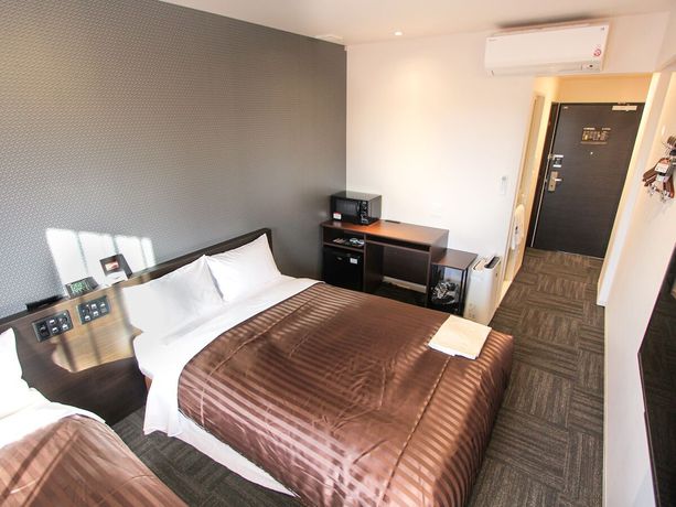 Imagen de la habitación del Hotel Livemax Osaka Kadoma. Foto 13