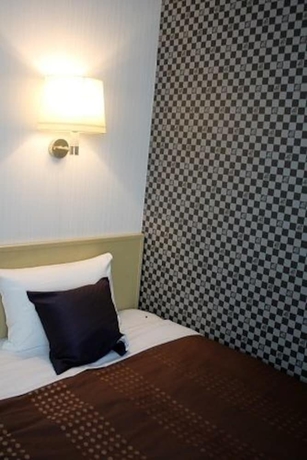 Imagen de la habitación del Hotel Livemax Otemae. Foto 7