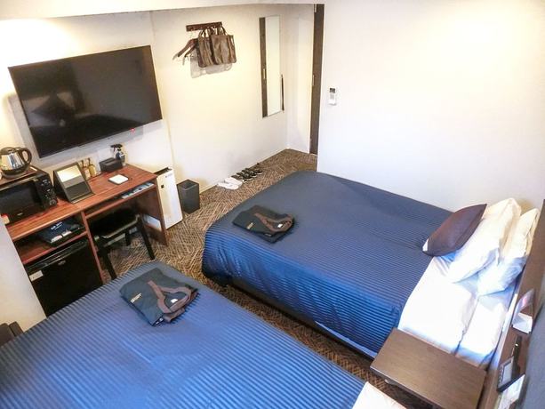 Imagen de la habitación del Hotel Livemax Premium Hiroshima. Foto 9
