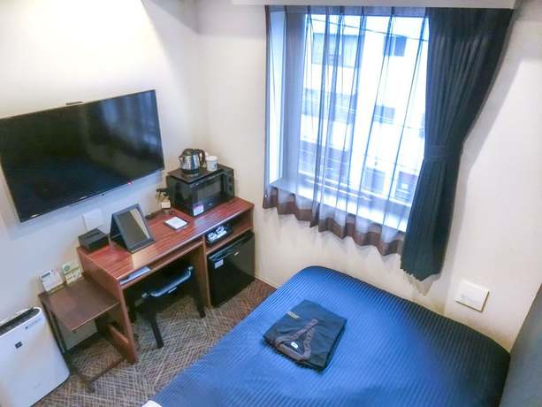 Imagen de la habitación del Hotel Livemax Premium Hiroshima. Foto 10