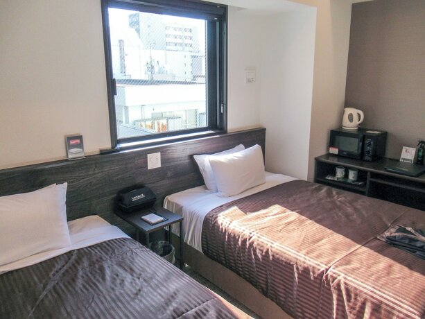 Imagen de la habitación del Hotel Livemax Premium Nagoya Marunouchi. Foto 19