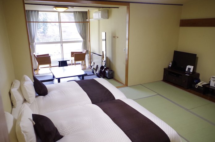 Imagen de la habitación del Hotel Livemax Resort Kawaji. Foto 2