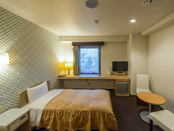 Imagen de la habitación del Hotel Livemax Resort Kofu. Foto 3