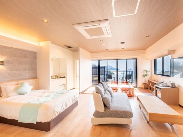Imagen de la habitación del Hotel Livemax Resort Miyahama Onsen-ocean. Foto 1