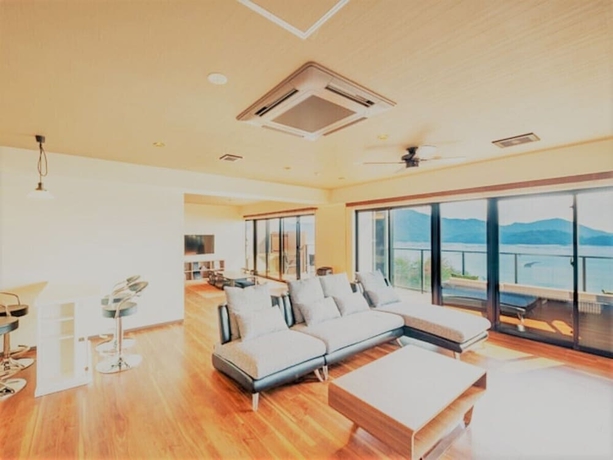 Imagen de la habitación del Hotel Livemax Resort Miyahama Onsen-ocean. Foto 3