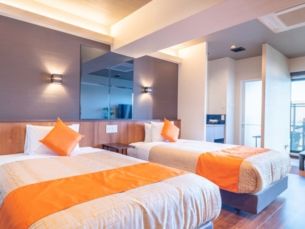 Imagen de la habitación del Hotel Livemax Resort Miyahama Onsen-ocean. Foto 7