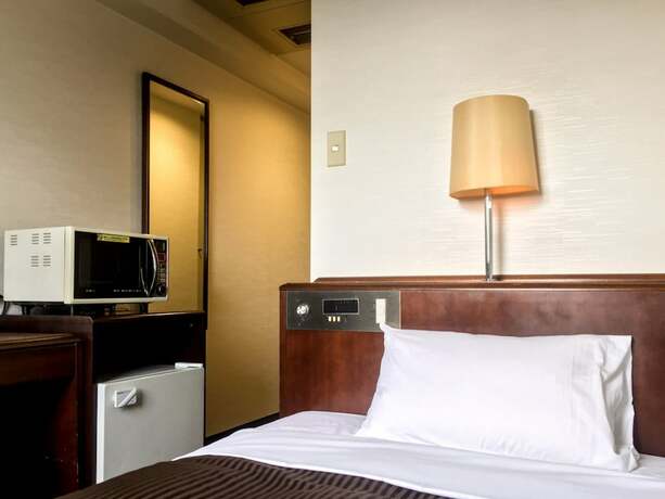 Imagen de la habitación del Hotel Livemax Sagamihara. Foto 22