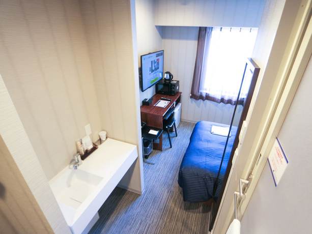 Imagen de la habitación del Hotel Livemax Sapporo Susukino. Foto 11