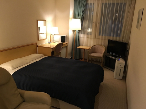 Imagen de la habitación del Hotel Livemax Sapporo-ekimae. Foto 17