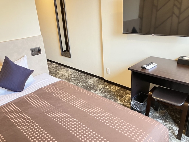 Imagen de la habitación del Hotel Livemax Shin-osaka. Foto 4