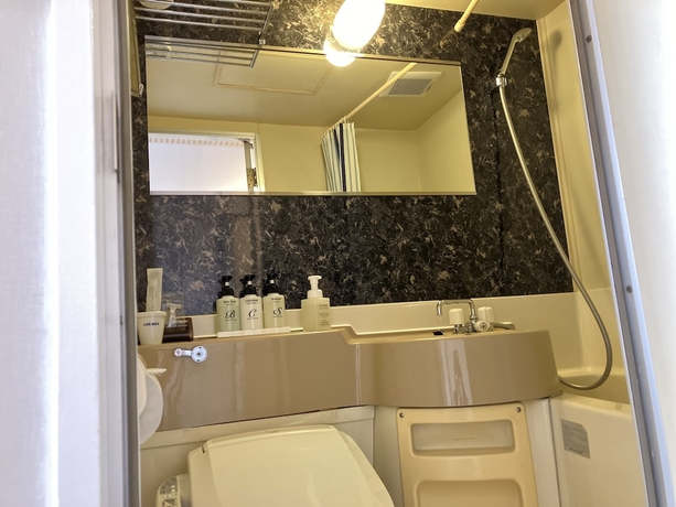 Imagen de la habitación del Hotel Livemax Shin-osaka. Foto 5