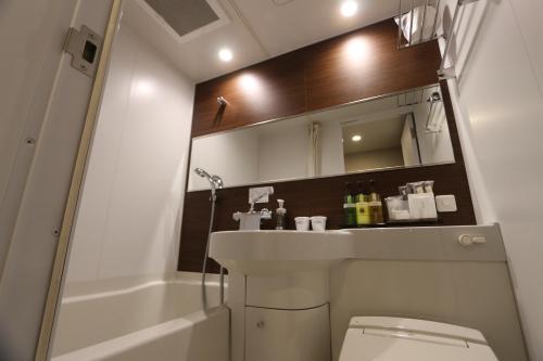 Imagen de la habitación del Hotel Livemax Takadanobaba Ekimae. Foto 9