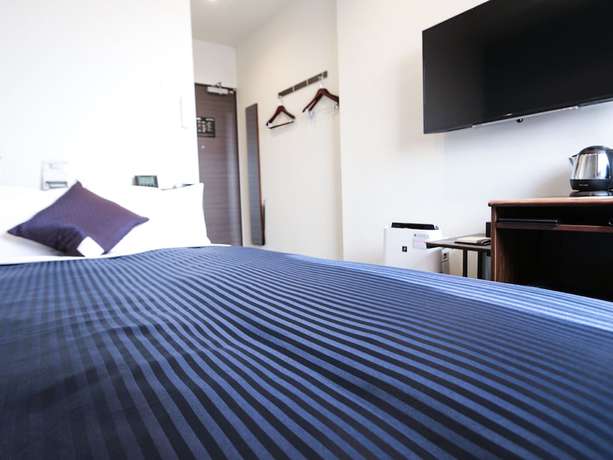 Imagen de la habitación del Hotel Livemax Tokyo Ayase Ekimae. Foto 8