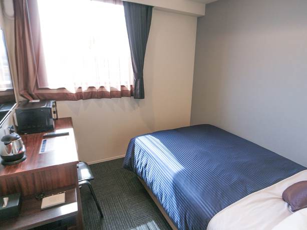 Imagen de la habitación del Hotel Livemax Tokyo Ayase Ekimae. Foto 11