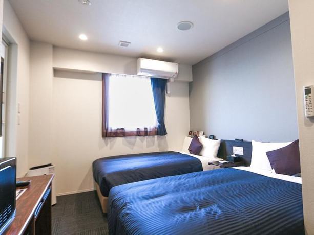 Imagen de la habitación del Hotel Livemax Tokyo Ayase Ekimae. Foto 12