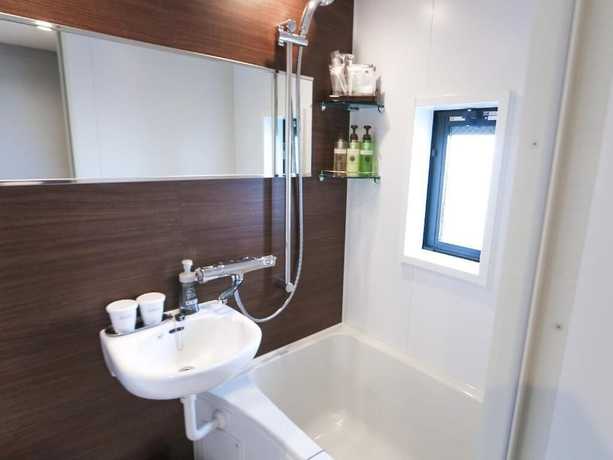 Imagen de la habitación del Hotel Livemax Tokyo Ayase Ekimae. Foto 14