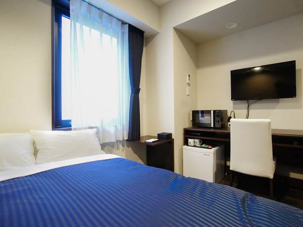 Imagen de la habitación del Hotel Livemax Tokyo Bakurocho. Foto 6